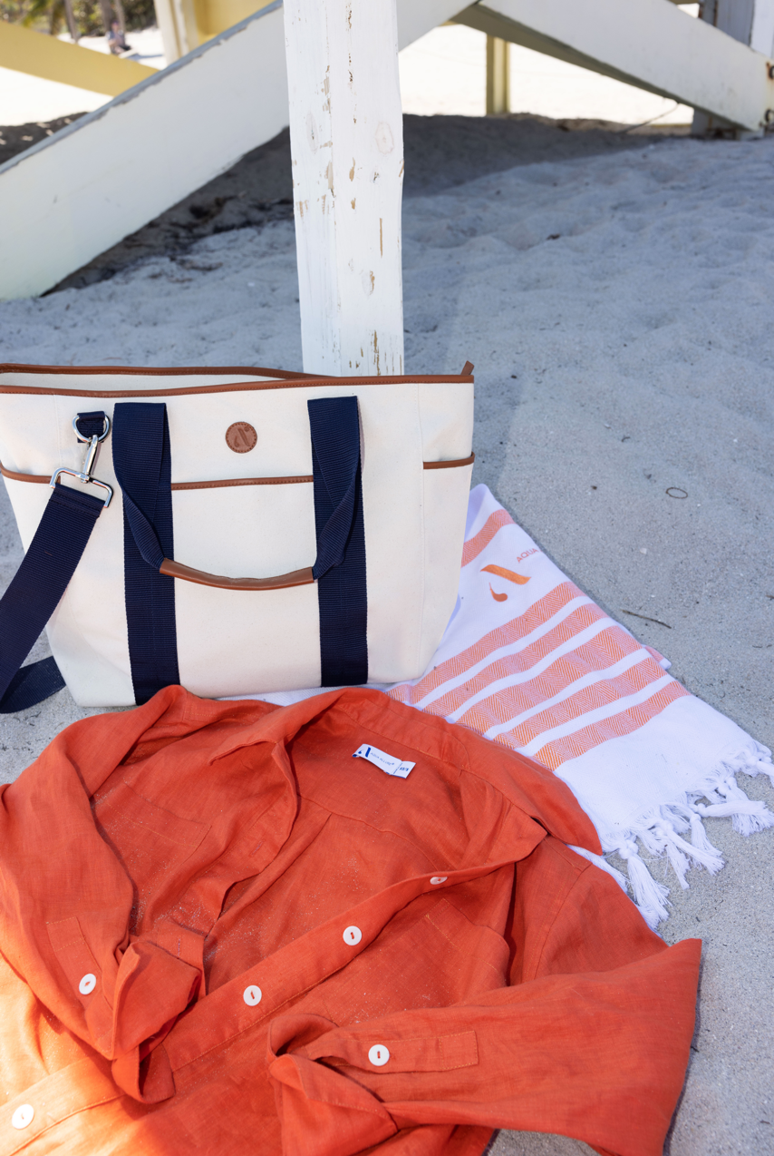 Orange European linen shirt with Apple skin leather tote with organic canvas made in USA.